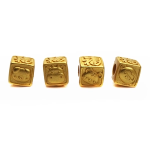 Macro view of gold-plated cubic beads featuring Chinese Fu characters and zodiac animals