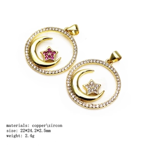 Celestial gold pendant featuring micro-pave cubic zirconia moon and star patterns