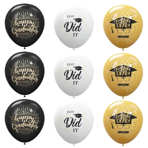 Detail of 12-inch graduation latex balloons with black gold prints and confetti accents