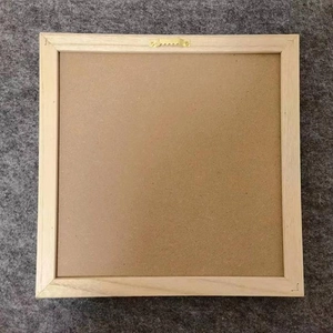 Rear view of square wooden felt letter board showing natural grain and wall hook
