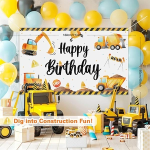 Construction theme birthday party set with excavator banner and yellow truck models