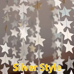 Silver star paper garland with metallic finish and polka dots for party decoration