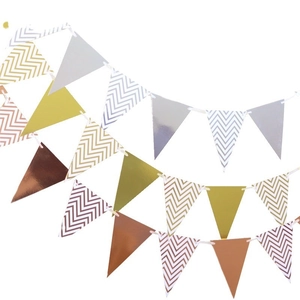 Metallic gold and silver triangle bunting banner with chevron patterns for party decor