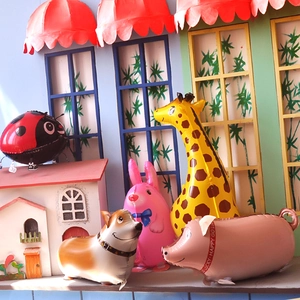 Adorable walking animal foil balloons set featuring pig, dog and giraffe for party decor