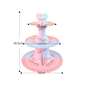 3-tier pink and blue Gender Reveal cupcake stand with girl or boy prints on white background