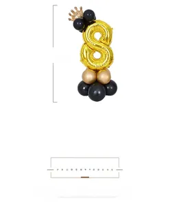 Detailed view of number 8 gold foil balloon column with crown top, total height 1 meter