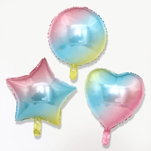 Rainbow gradient foil balloon set with round, star, and heart shapes for birthday party