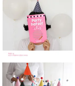 Detail of 11-piece party hat set including 9 colorful cone hats and 2 glitter crowns