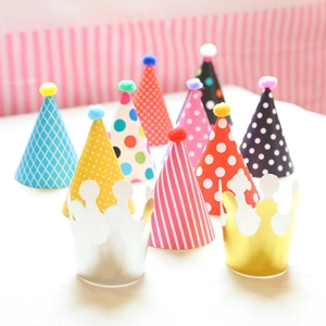 Set of 11 colorful birthday party hats with pom-poms and crowns for celebration