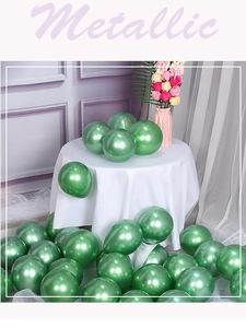 Macro shot of metallic green latex balloons showing glossy texture and surface reflection