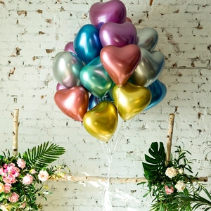 Bunch of colorful heart-shaped metallic latex balloons for romantic wedding decorations