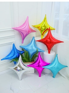 Macro detail of colorful four-pointed star foil balloons for party decoration displays
