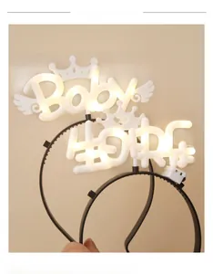 Detail showing the LED light-up headband with Baby and Happy Birthday lettering