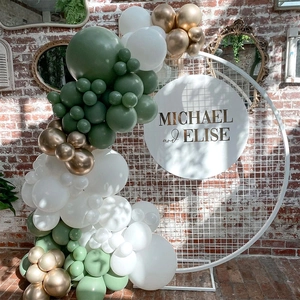 Sage green and gold latex balloon arch kit with white grid backdrop for party decor