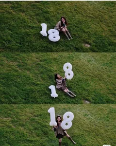Outdoor setup featuring large 40 inch creamy white number 18 balloons for birthday decor