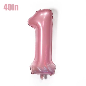 Detail of a large 40 inch pink foil number 1 balloon for baby birthday party decorations