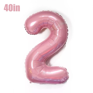 Detail of 40-inch pink foil number 2 balloon with metallic finish for birthday party decor