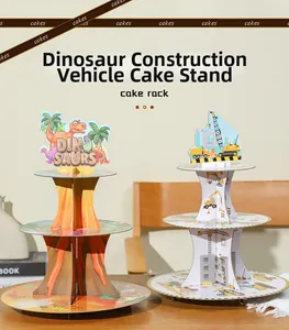 Three-tier cardboard cake stands featuring dinosaur and construction vehicle themes