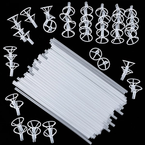 Clear plastic balloon sticks with round and V-shaped holders on black background