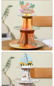 Detail view of 3-tier cardboard cupcake stands with dinosaur and construction themes