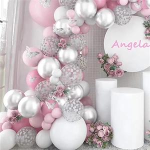 Pastel pink and silver balloon garland kit with paper butterflies and floral accents