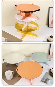 Three-tier disposable cardboard cupcake stand in rose gold, champagne, and silver tones