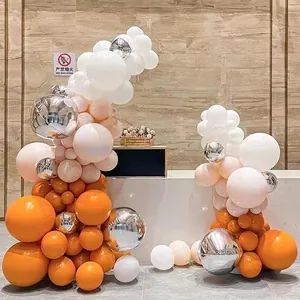 DIY shapable balloon arch kit with orange white and peach balloons for party decoration
