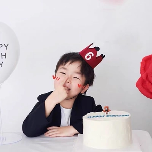 Red felt birthday crown for toddlers featuring white number 6 and comfortable elastic band