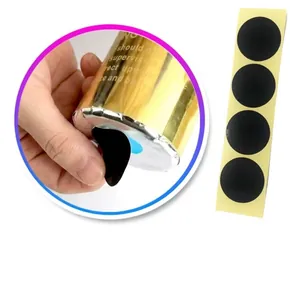 Gender reveal party gold confetti cannon with black stickers for secret powder reveal