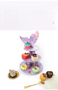 Three-tier mermaid themed cardboard cupcake stand with scales and coral patterns