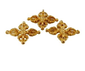 Three 24K gold plated Buddhist Vajra cross pendants shown on a clean white background