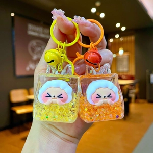 Cartoon liquid quicksand keychain with cute white figures and glitter in acrylic bags