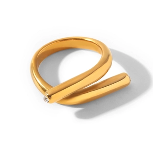 Close-up of gold-plated titanium steel wrap ring with sparkling cubic zirconia accents