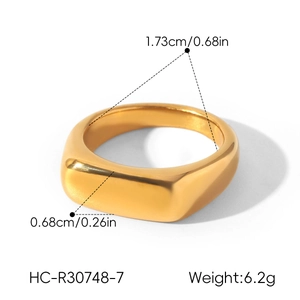 Close-up of a wide gold titanium steel ring with precise measurements and weight info