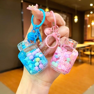 Creative flowing liquid drifting bottle keychain with macaron beads and colorful sequins