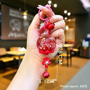 Detailed view of red liquid quicksand keychain dimensions showing 8.8cm height and 3.7cm width