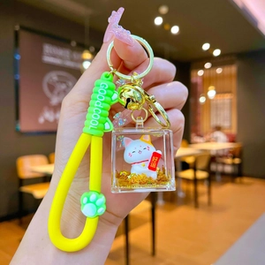 Creative Lucky Cat keychain with golden glitter and liquid inside acrylic square cube