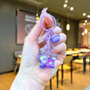 Cute purple star liquid quicksand keychain with glitters and matching bell charm