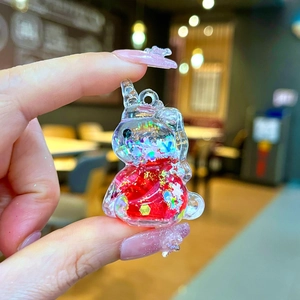 Mini unicorn glitter liquid keychain charm with colorful stars and heart sequins