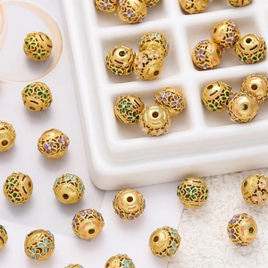 Holle gouden bloemkralen met kleurrijke emaille bloemmotieven voor DIY sieraden