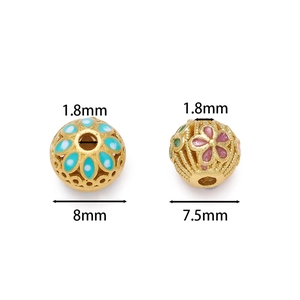 Detailed macro view showing 8mm and 7.5mm gold hollow enamel cloisonne beads