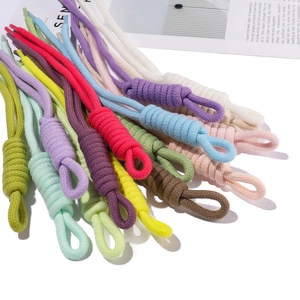 Handwoven colorful drawstring cords for bags and phones with decorative loop knots