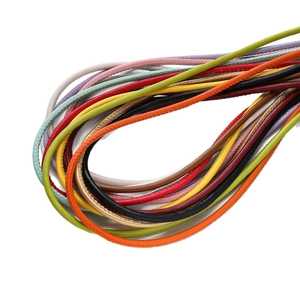 Colorful braided PU leather cords in multiple vibrant shades for DIY bag straps and crafts