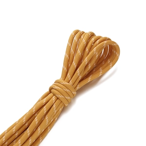 Nahaufnahme der 5 mm ingwergelben Polyester-Kordel mit weißem Punktmuster