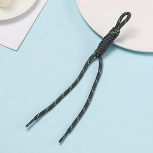 Close-up of black and neon green woven polyester lanyard with snake knot detail