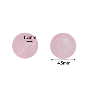Λεπτομέρεια macro από ροζ γυάλινες χάντρες 4,5mm με τρύπα 1,2mm για DIY κοσμήματα