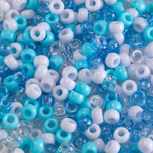 Macro shot of blue and white large-hole acrylic beads for DIY jewelry and crafts