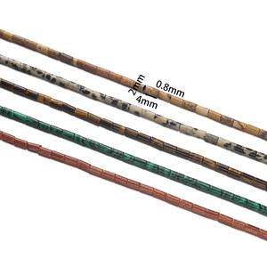 Détail de perles cylindriques en pierre naturelle 2x4mm avec trou de 0,8mm pour bijoux