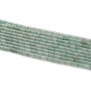 Vue détaillée de perles cylindriques en aventurine verte pour création de bijoux