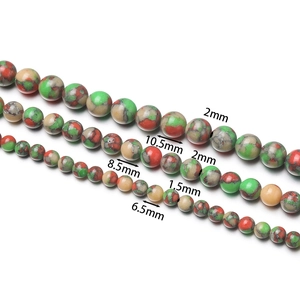 Drei Größen bunter gesprenkelter Steinperlen mit Durchmessern von 6,5 mm, 8,5 mm und 10,5 mm